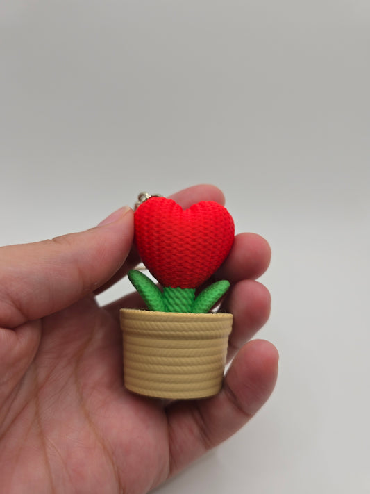Crocheted red heart flower clicker