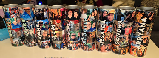 Row of personalized tumblers with various images on a table in a room setting.