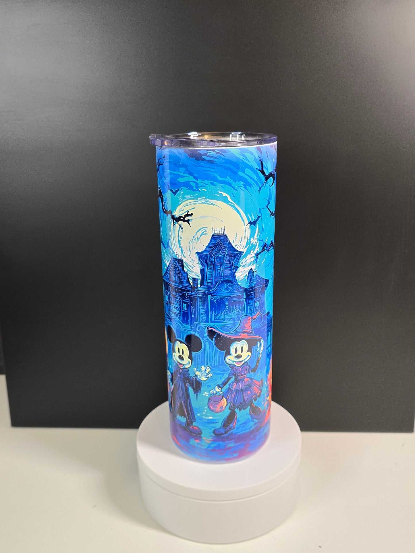 Spooky magical mouse by haunted house