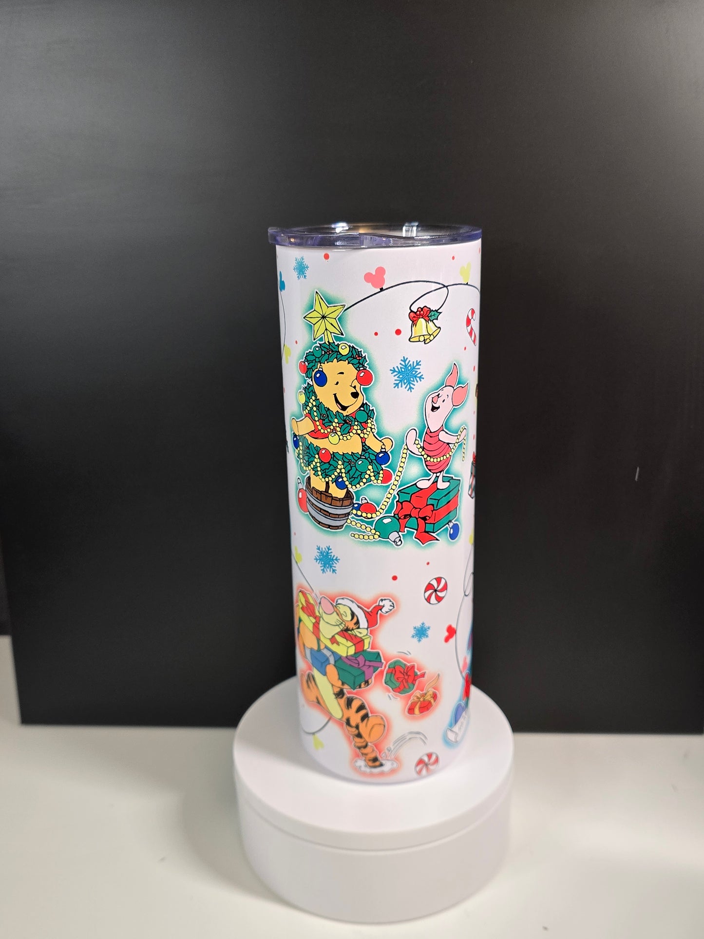 Classic bear and friends wrapped in Christmas lights