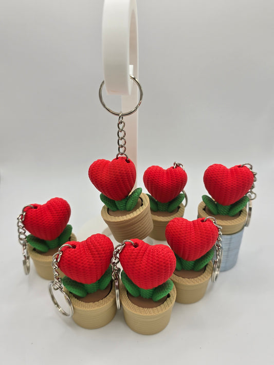 Crocheted red heart flower clicker
