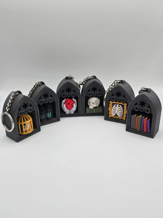 Small Gothic Bookshelf Clicker Keychain