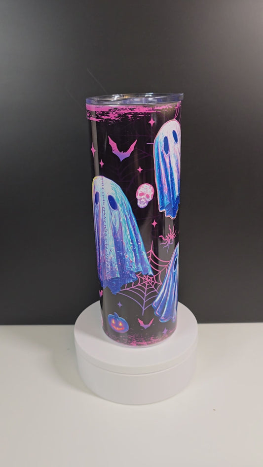 Cute purple ghosts in abstract pastel design